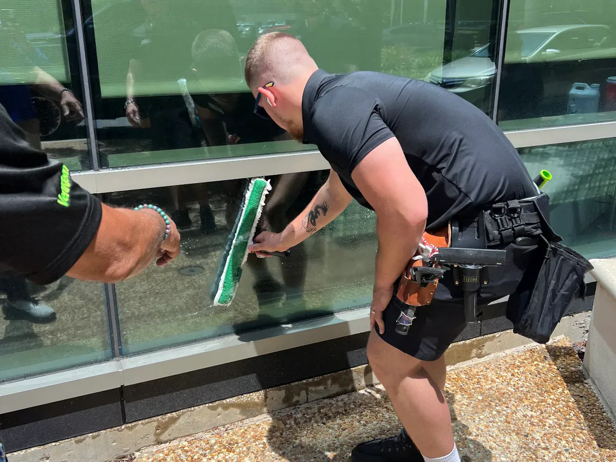 Occupied-campus glass-cleaning field image