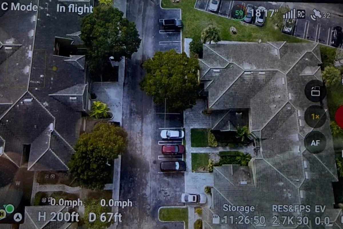 Facility exterior before drone-applied MultiWash cleaning