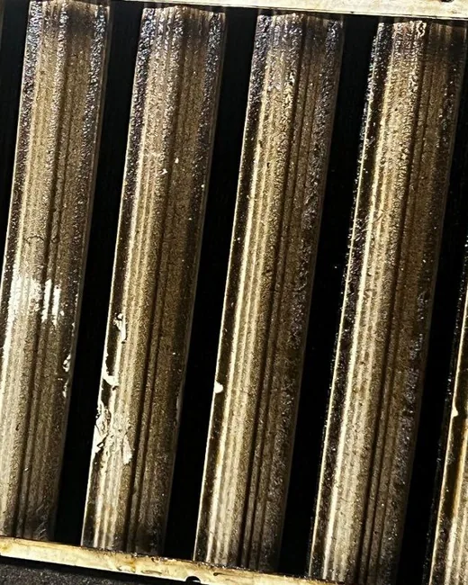 Restaurant hood filter before VertKleen degreasing